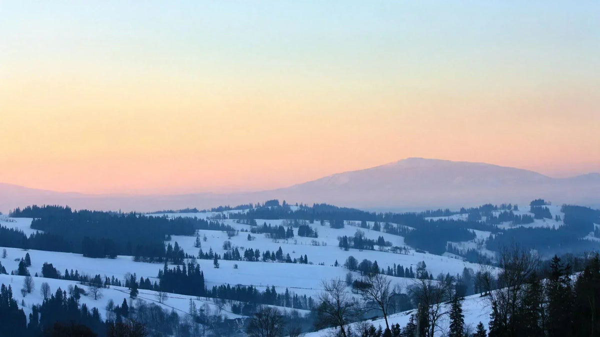 December birth month crystal landscape featuring Sagittarius and Capricorn winter solstice light and frost.