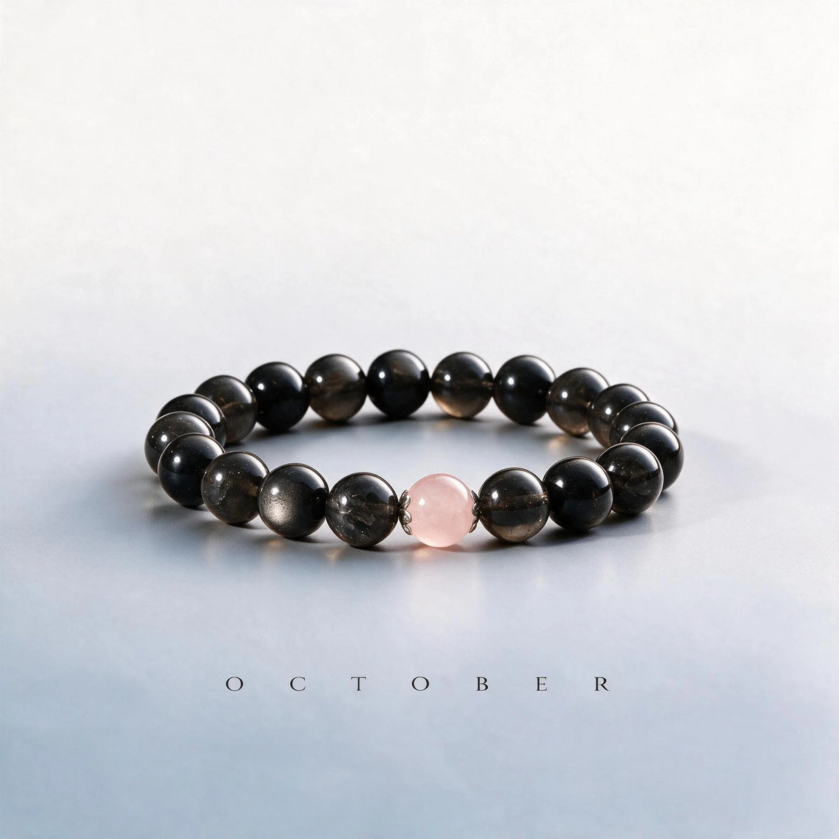Custom October birth month Root & Third Eye bracelet with obsidian, smoky quartz, and rose quartz as a meaningful gift.
