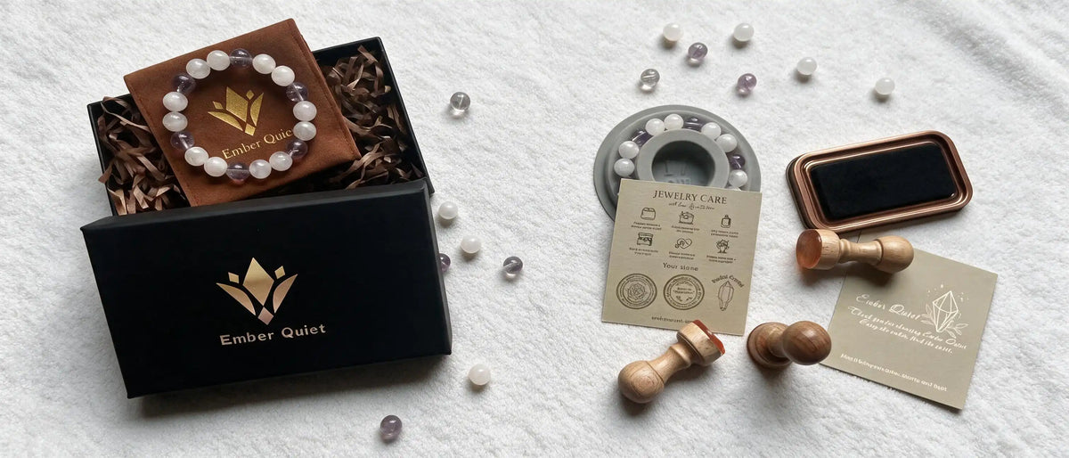 An elegant unboxing gift presentation of handcrafted crystal bracelet by Ember Quiet, packed with care for mindful and meaningful gifting.