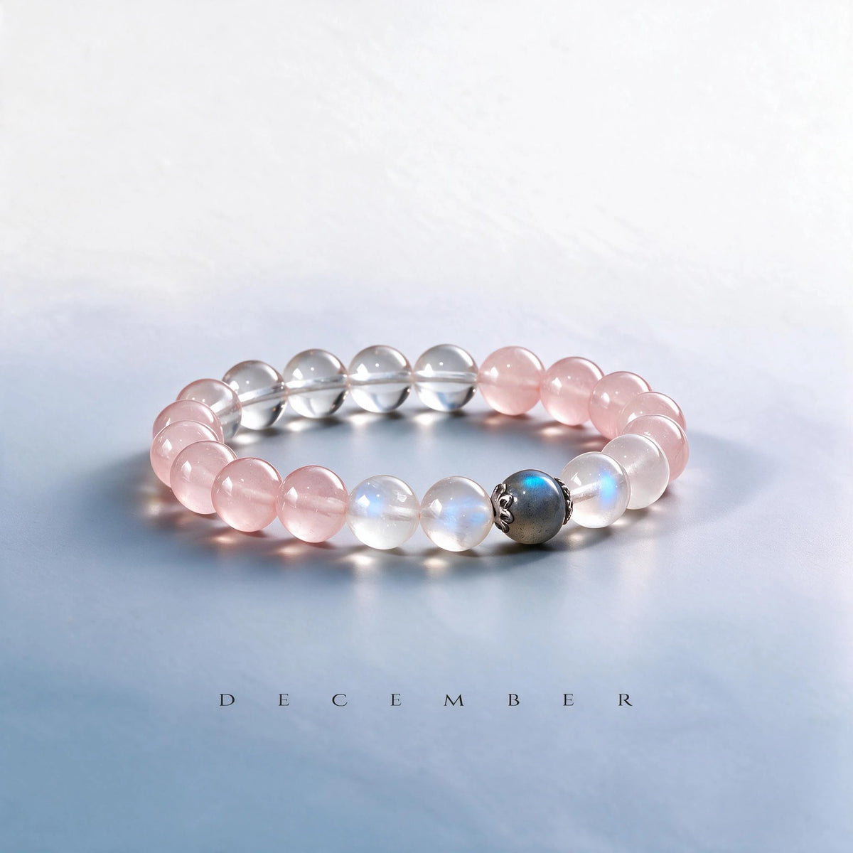 Custom December birth month Heart & Crown chakra bracelet with moonstone, rose quartz, and labradorite as a meaningful gift.
